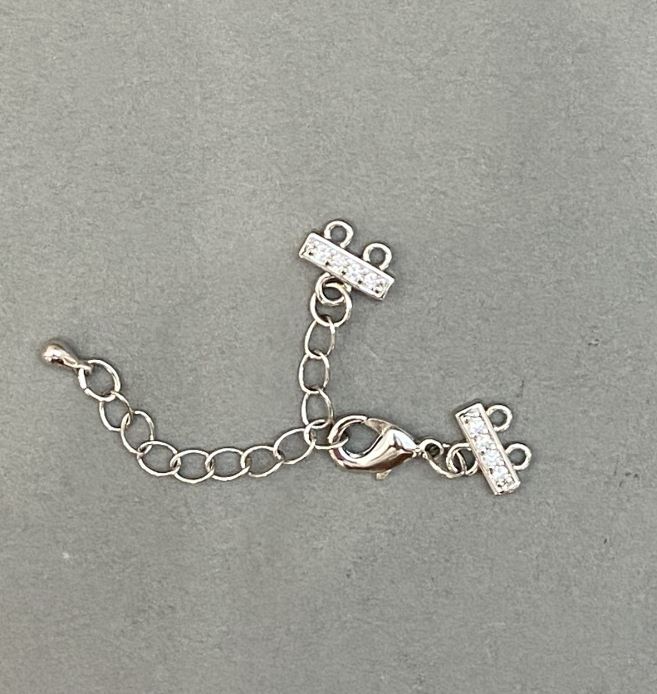 Clasp for two-strand bracelets and beads with crystals and extension chain, silver-colored metal, diameter 9×12 mm, length 5 cm