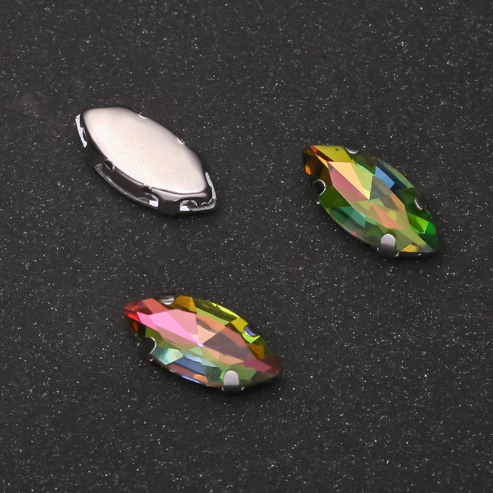 Price per pack /10 pcs. Rainbow sew-on crystal in prong setting, oval 7x15 mm