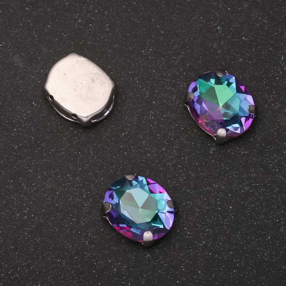 Price per pack / 10 pcs. Sew-on crystal in prong setting 'Oval 8×10 mm' green-raspberry