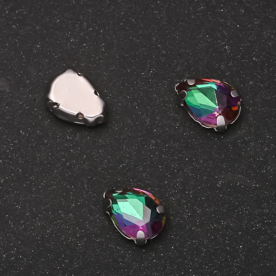 Price per pack / 10 pcs. Sew-on crystal in a stud, drop shape 7x10mm green-magenta