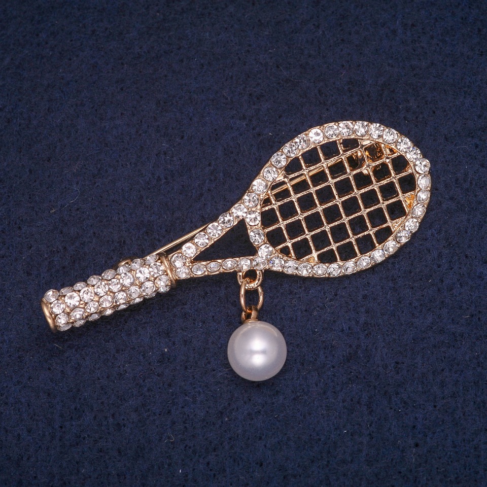 Brooch 'Racquet' with a Bead Pendant and White Crystals, Golden Metal 21x55 mm