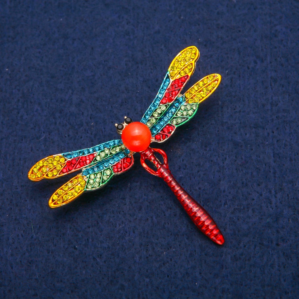 Butterfly brooch-pendant with multicolored rhinestones, bead, cat's eye and red enamel, gold-tone metal 48x58 mm
