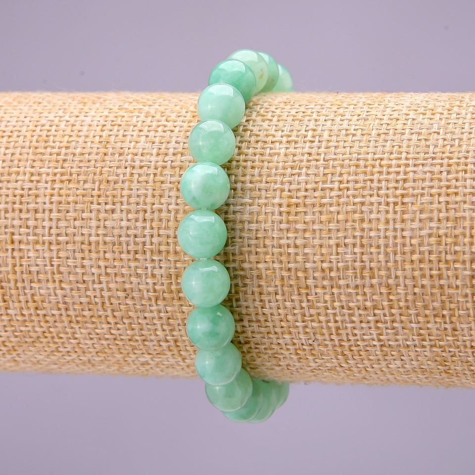 Bracelet with natural Burmese jadeite smooth beads, diameter 8(±)mm, on elastic, length 18 cm