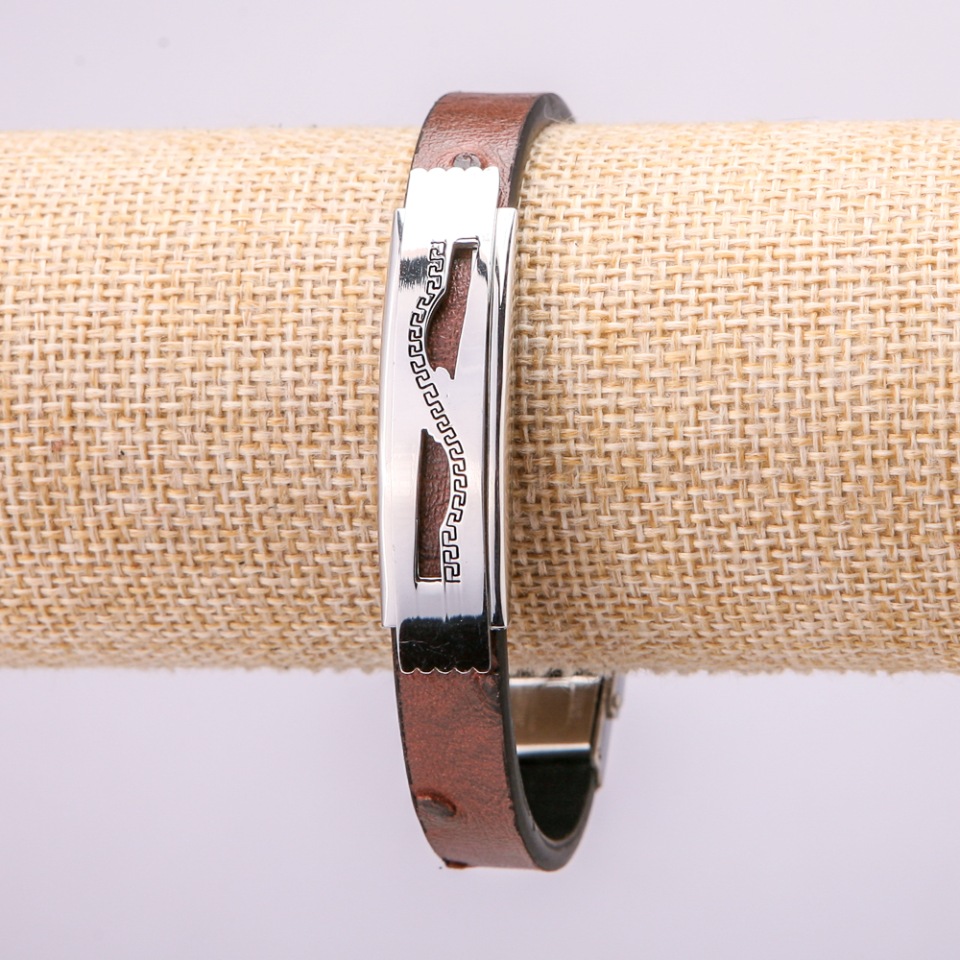 Bracelet with metal inlay, length 21 cm, thickness 10 mm, brown eco-leather, with clasp