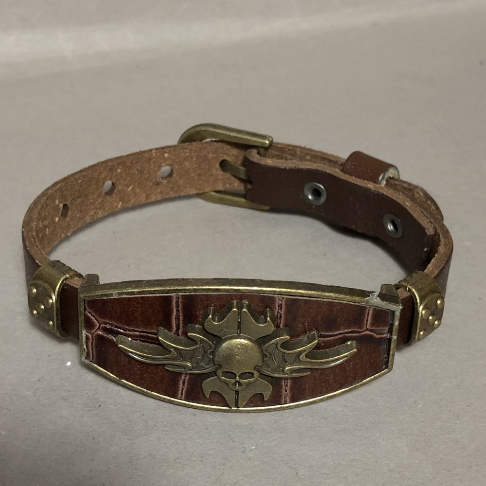 Bracelet with metal inserts, length 16–24 cm, thickness 20 mm, eco-leather, brown color on strap