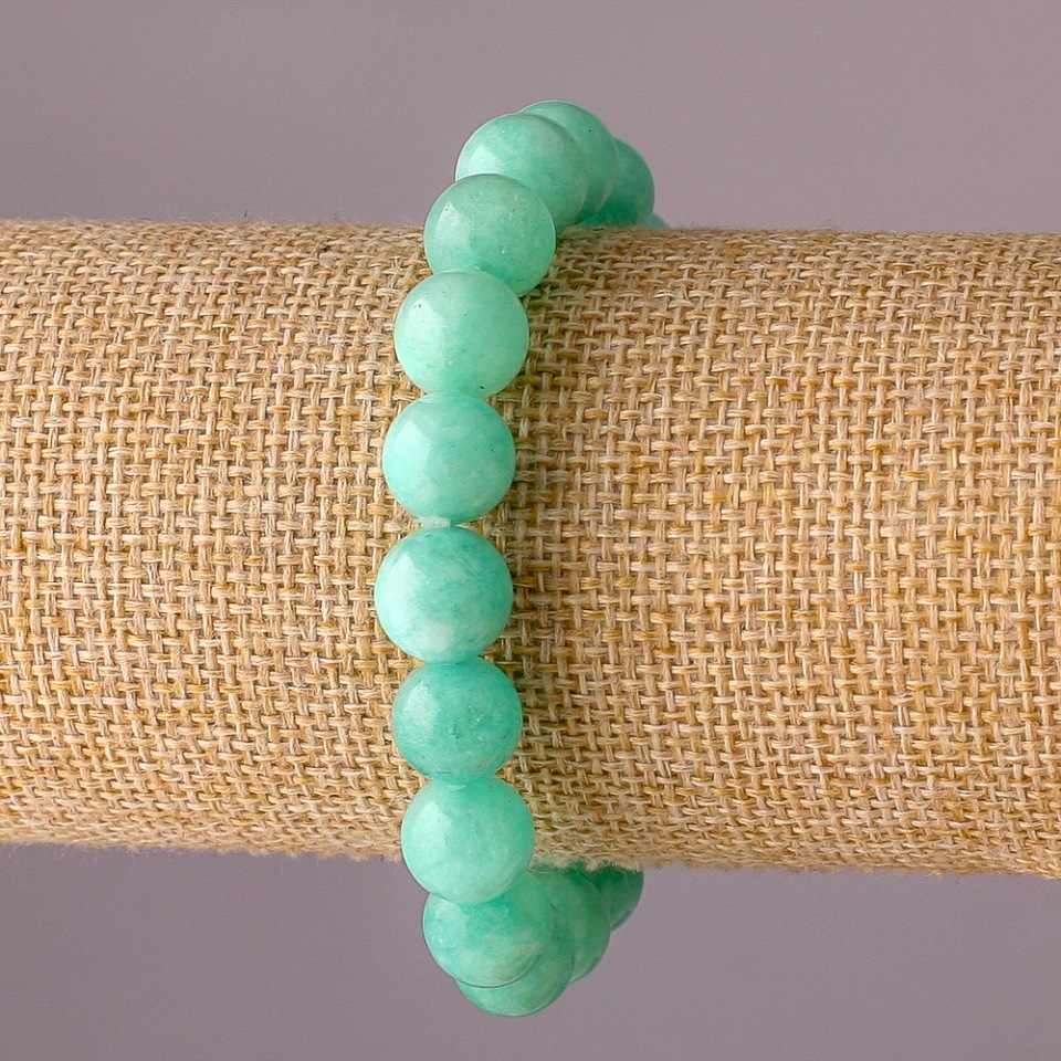 Jadeite bracelet on elastic — smooth beads, 10 mm diameter, 18 cm length