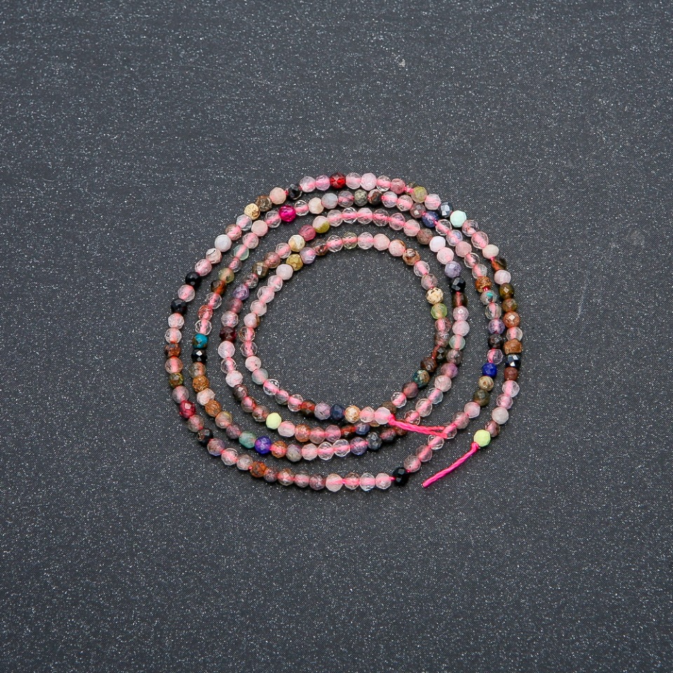 Bead strand of assorted natural stones, faceted balls, diameter 2 mm, length 39 cm