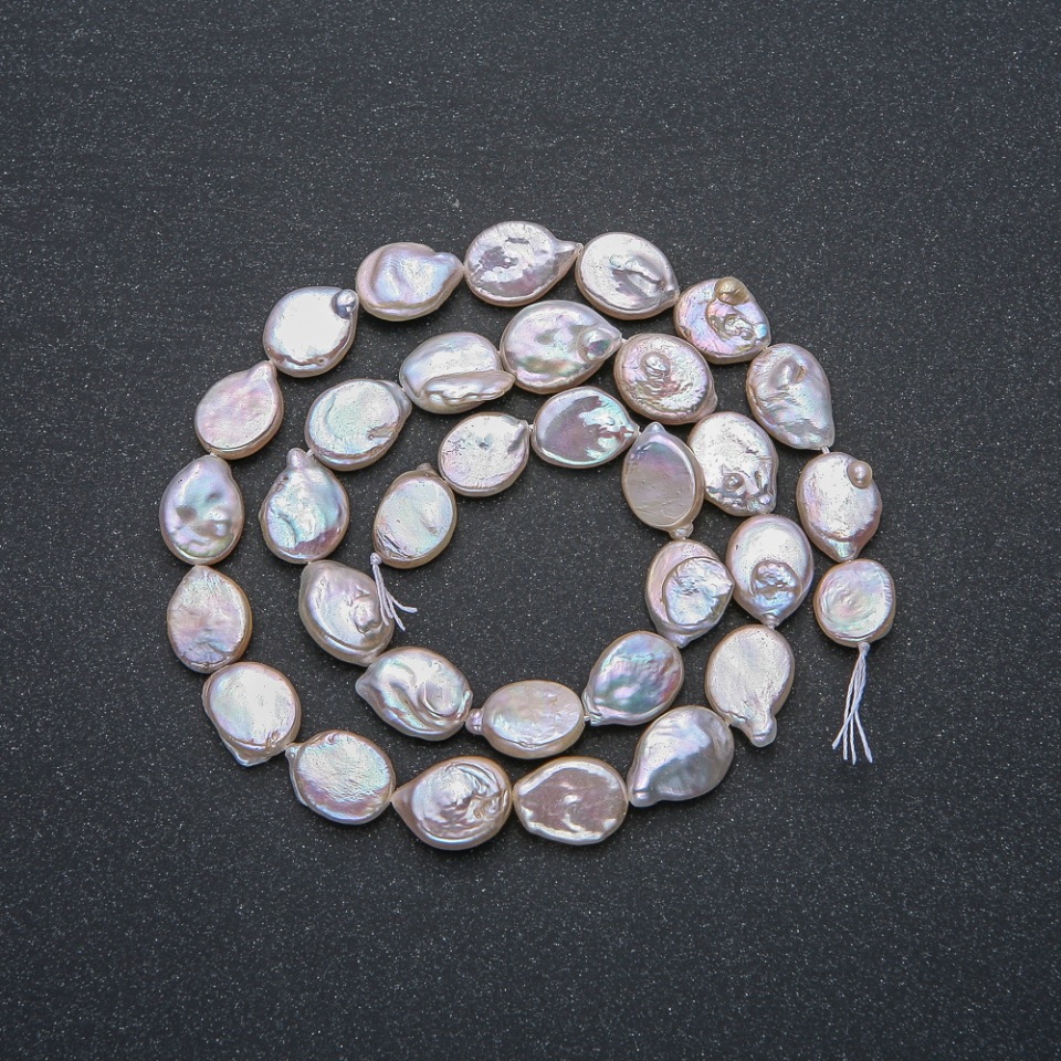 Natural Baroque Pearl Thread, 12x9 mm diameter, length 41 cm +/- with petrol iridescence