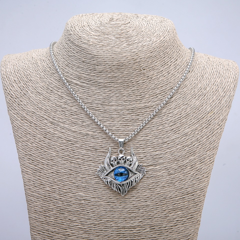 Pendant 'Demon's Eye' 45x40 mm on a chain, length approx. 70 cm, silver-colored metal