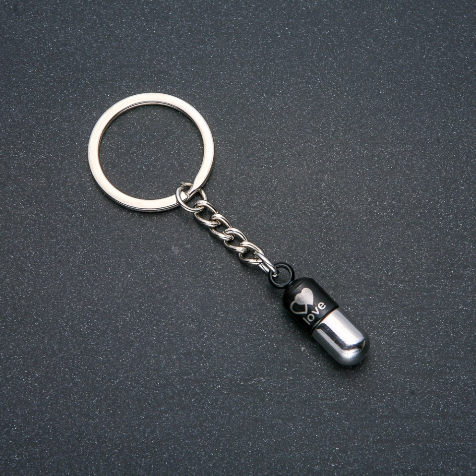 Keychain 'Love Capsule', diameter 30x9 mm, length 8 cm, silver-colored metal