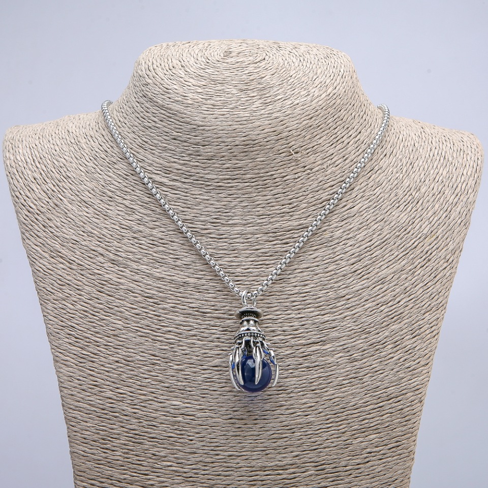 Pendant 'Paw with Sphere' 40x20 mm on a chain, length 70 cm ± silver-tone metal