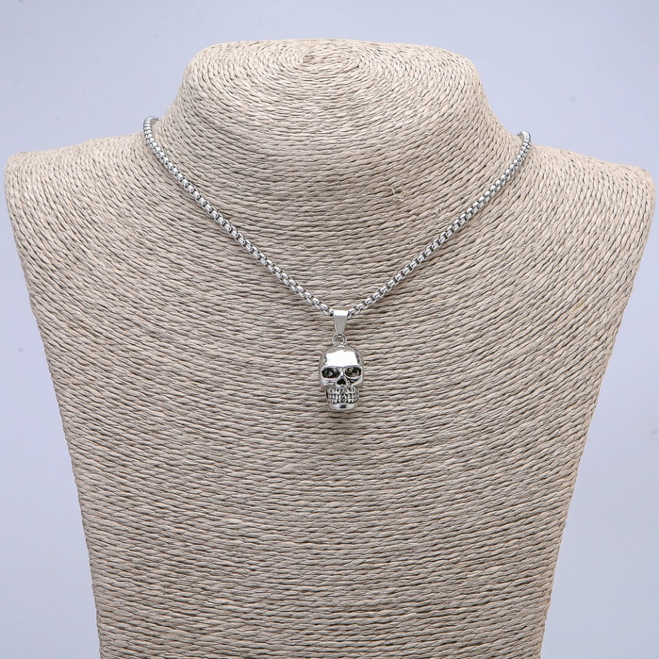Pendant Skull 25x10 mm on a chain, 65 cm length, silver color