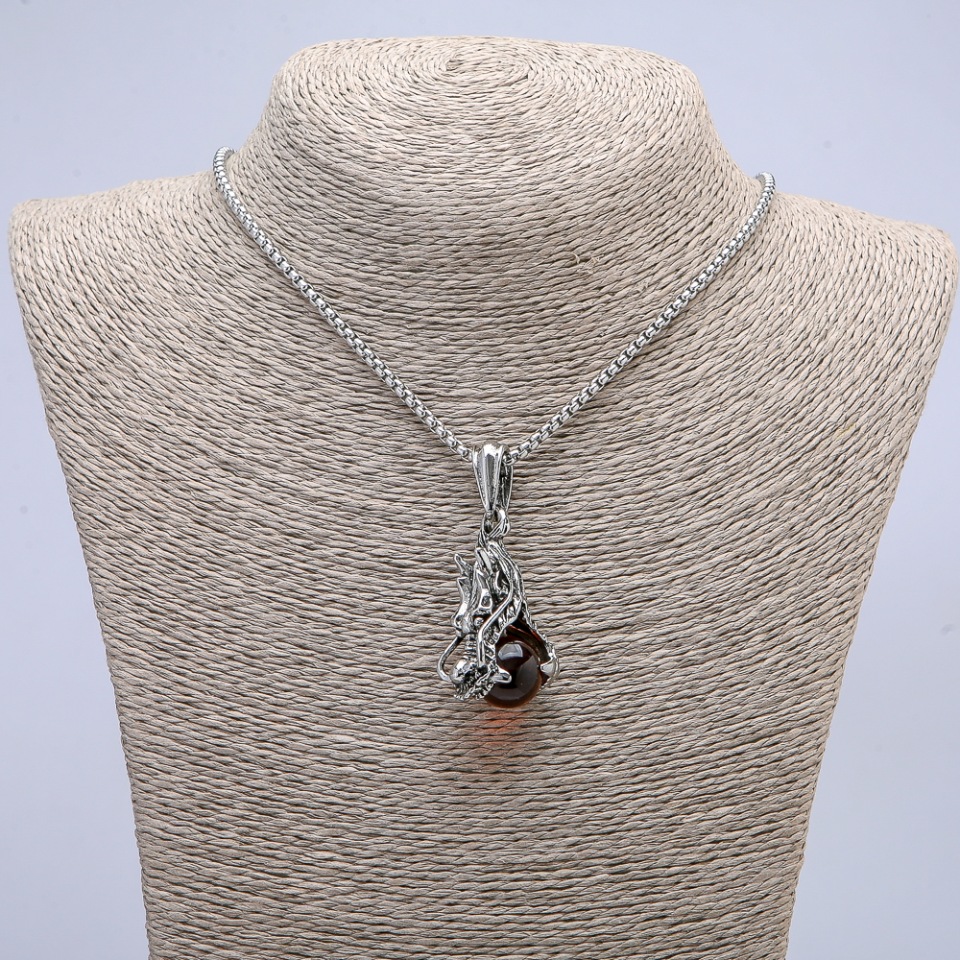 Dragon Head Pendant with Red Sphere, 22x51 mm on a chain, chain length 65 cm, silver-colored metal