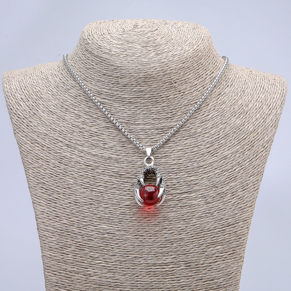 Pendant 'Ball in paw' red 42x22mm on chain, length 70 cm; silver-colored metal