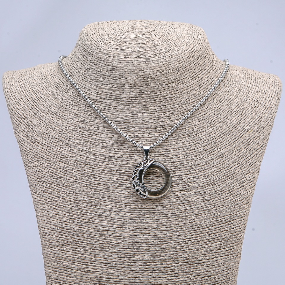Pendant 'Moon' dark gray 35x28mm on chain, length 70 cm +/- silvery metal