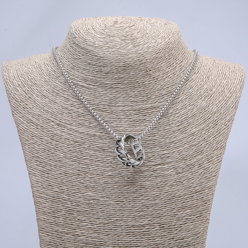 Pendant 'Ring' 26x10mm on a chain, length 70 cm +/-, silver-tone metal