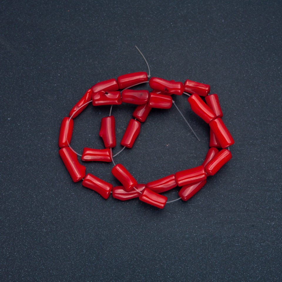 Beads on thread, natural coral, faceted, diameter 8–15×4–6 mm ±, length 39 cm ±, assorted sizes