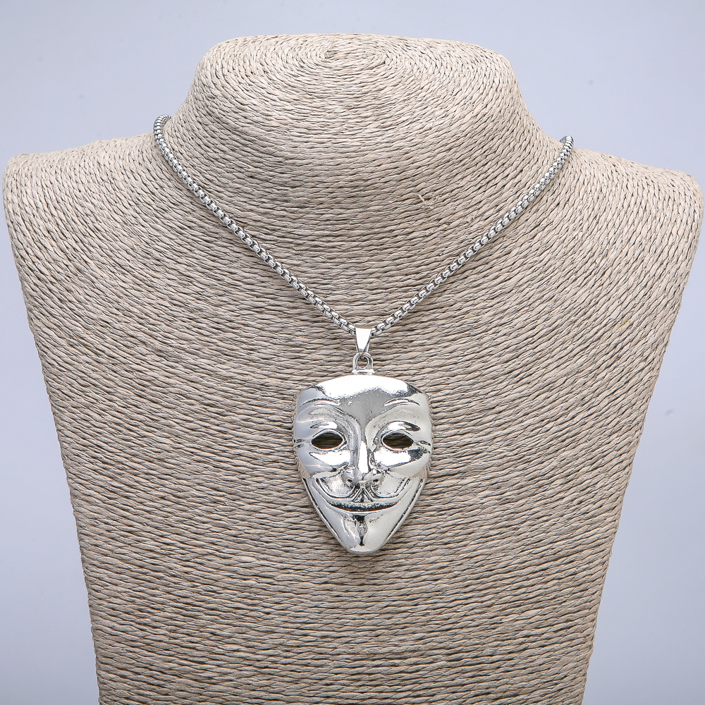 Pendant "Mime Mask" 48x38 mm on a chain, length 65 cm, silver-toned metal