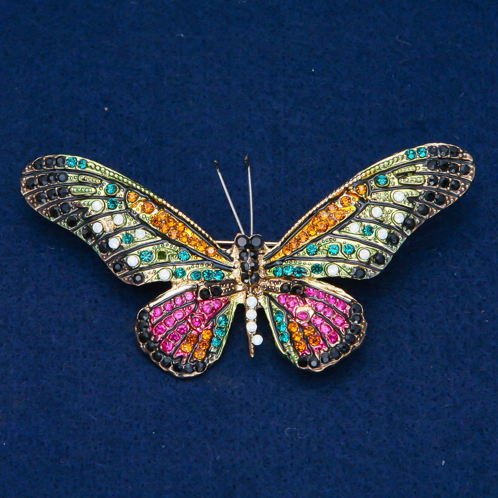 Butterfly brooch in gold-toned metal with multicolored rhinestones, 42×82 mm