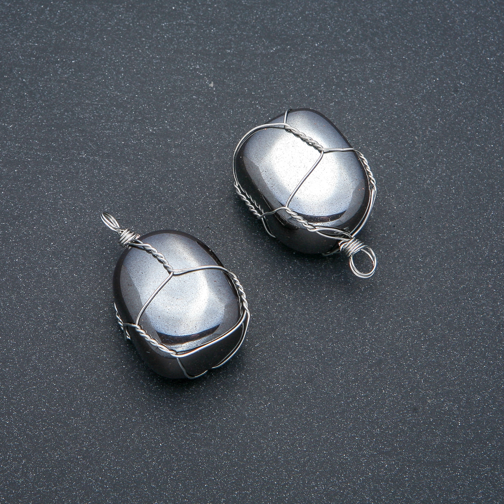 Pendant in a silver-woven hematite setting, diameter 30×22 mm+