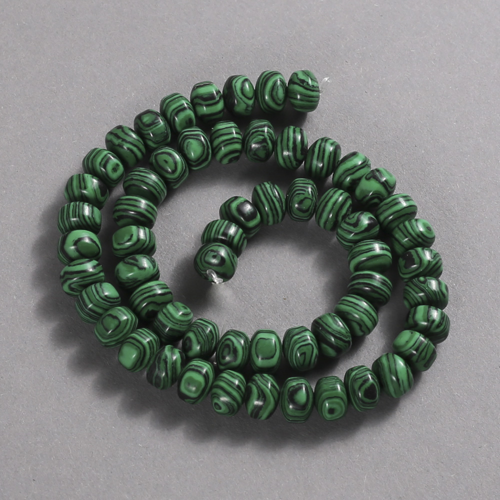 Malachite beads on thread (pressed). Smooth rondel, 9x7 mm, length 39 cm
