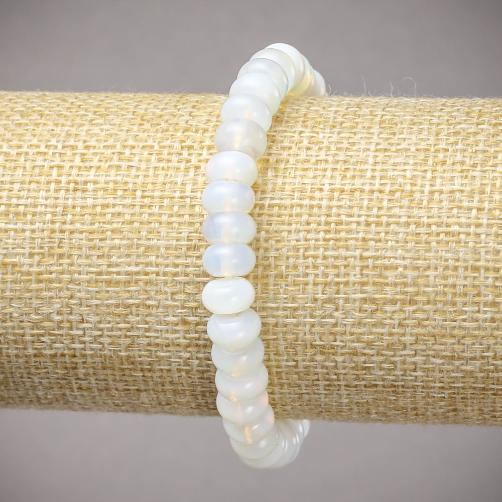 Elastic bracelet with synthetic Moonstone, smooth rondelle beads, diameter 8×5 mm, length 18 cm