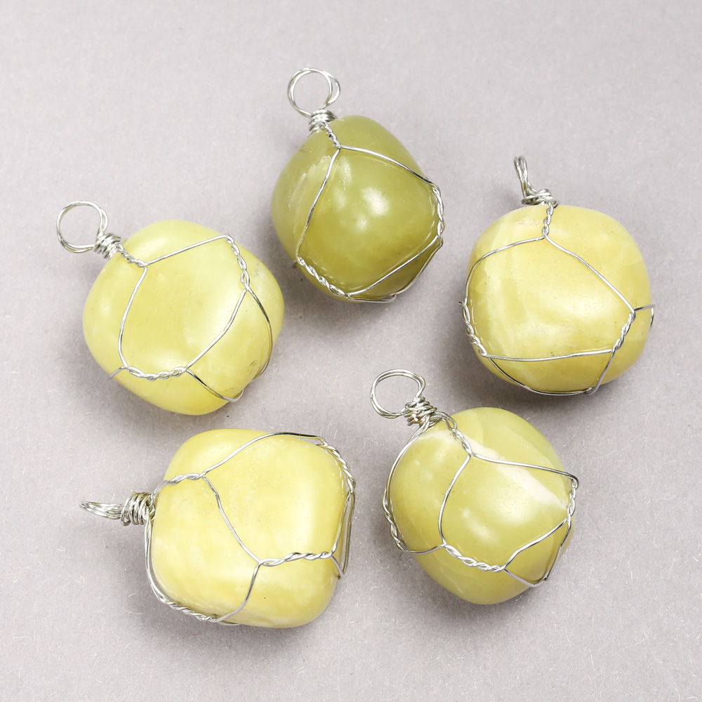 Pendant in a silver weave with natural Jadeite stone, diameter 35x20 mm+