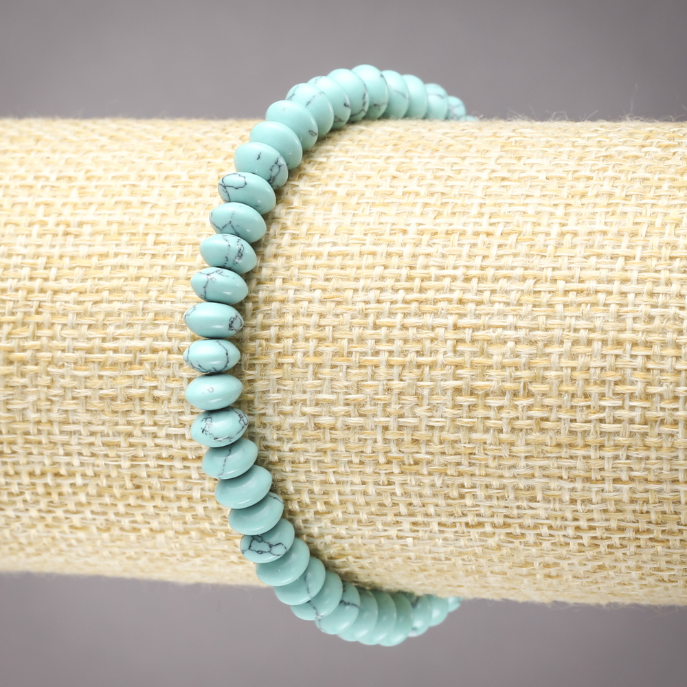 Elastic turquoise bracelet with smooth rondelles, 6×3 mm diameter+