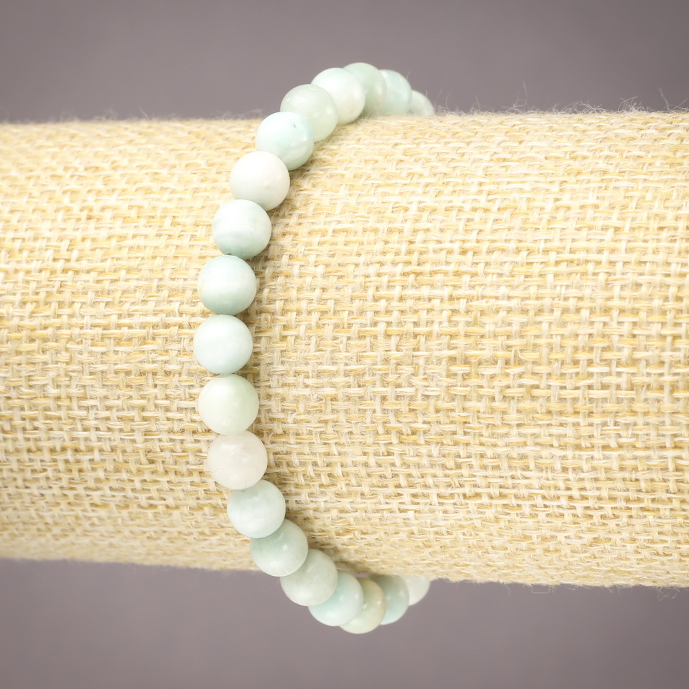Elastic bracelet with natural Larimar stone — smooth bead, 6 mm diameter+