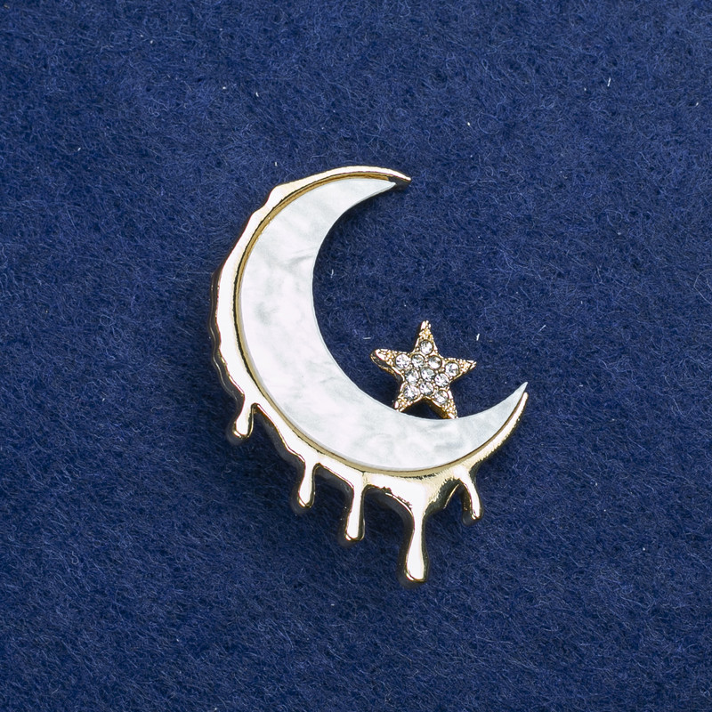 Brooch 'Moon' with gold-tone metal, mother-of-pearl and crystals, 38×27 mm +