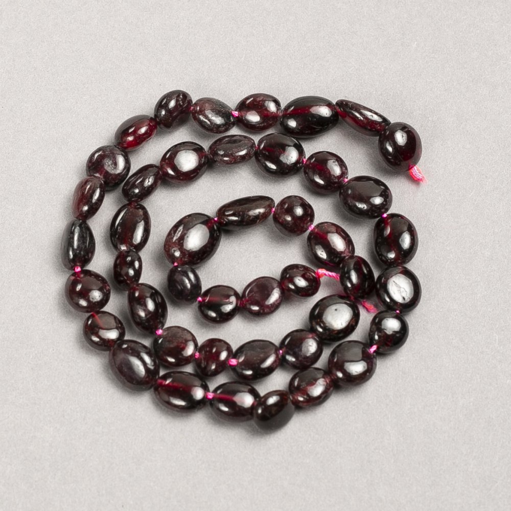 Beads on a thread, natural gemstone Garnet faceted, diameter 8x10mm, length 40cm