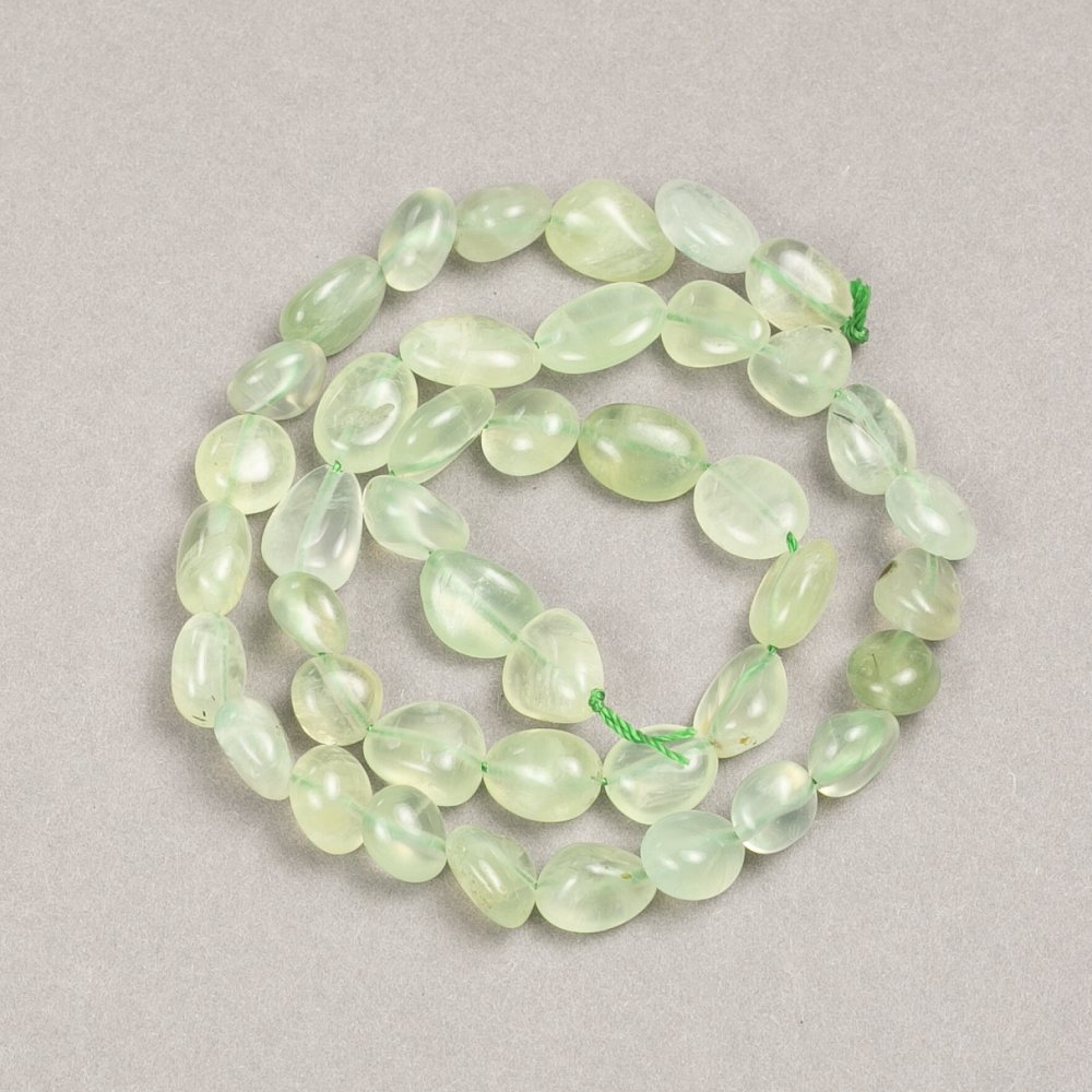 Beads on thread, natural Prehnite, faceted, 10x8 mm, length 38 cm