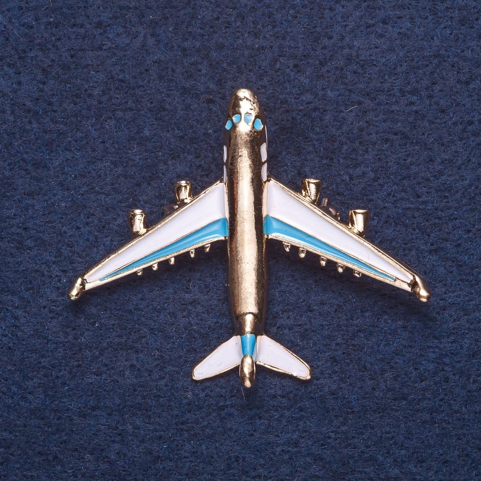 Brooch "Plane" white and blue enamel, gold-tone metal, 4x5 cm