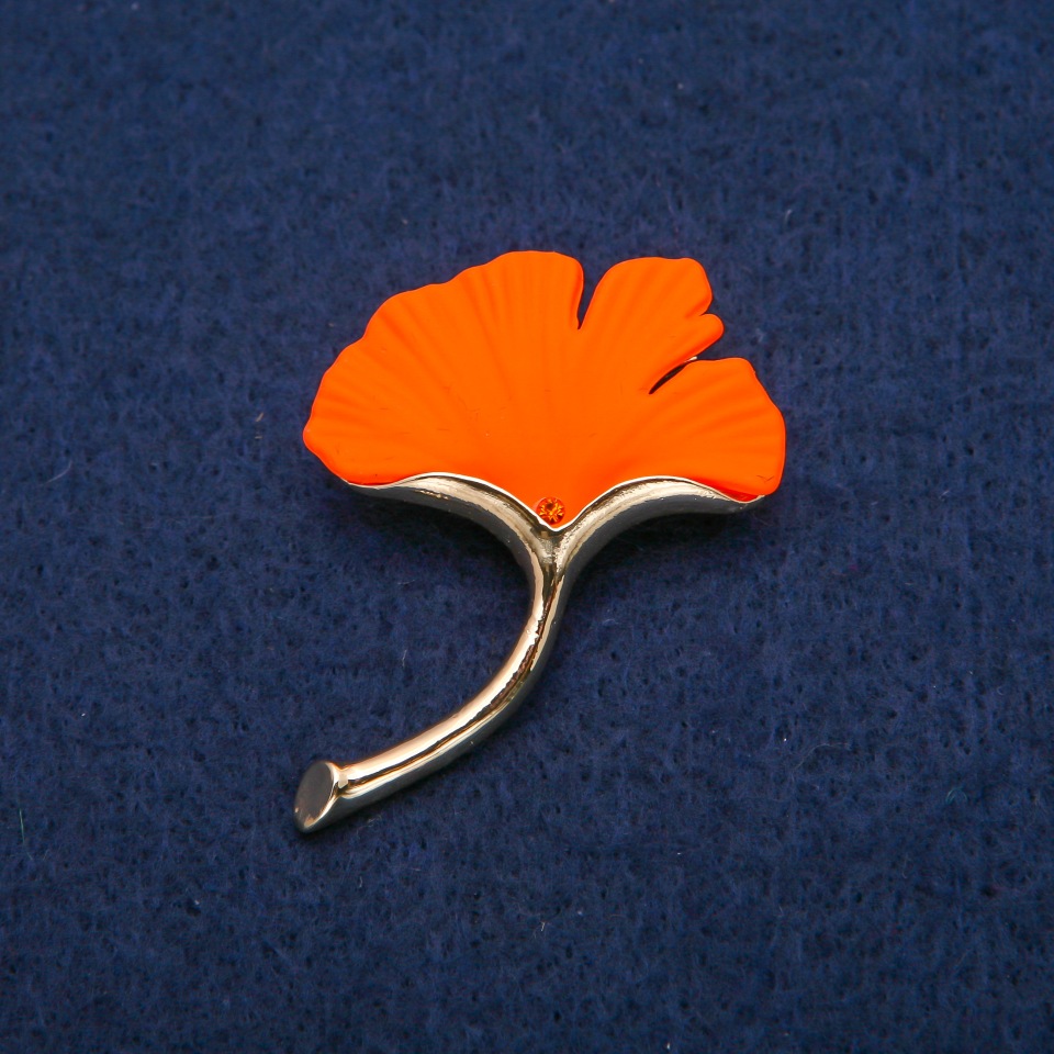 Bach Leaf orange matte enamel, gold-tone metal 33×47mm