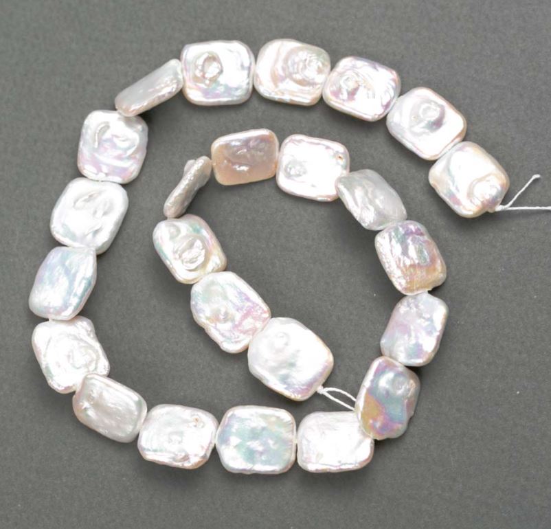 Baroque pearls with a gasoline shade, diameter 15-17×13-16 mm +-, length 38 cm+