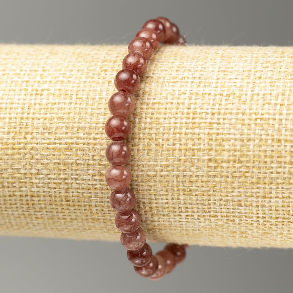 Stretch bracelet with imitation selenite, smooth beads, diameter 6.5 mm, length 18 cm