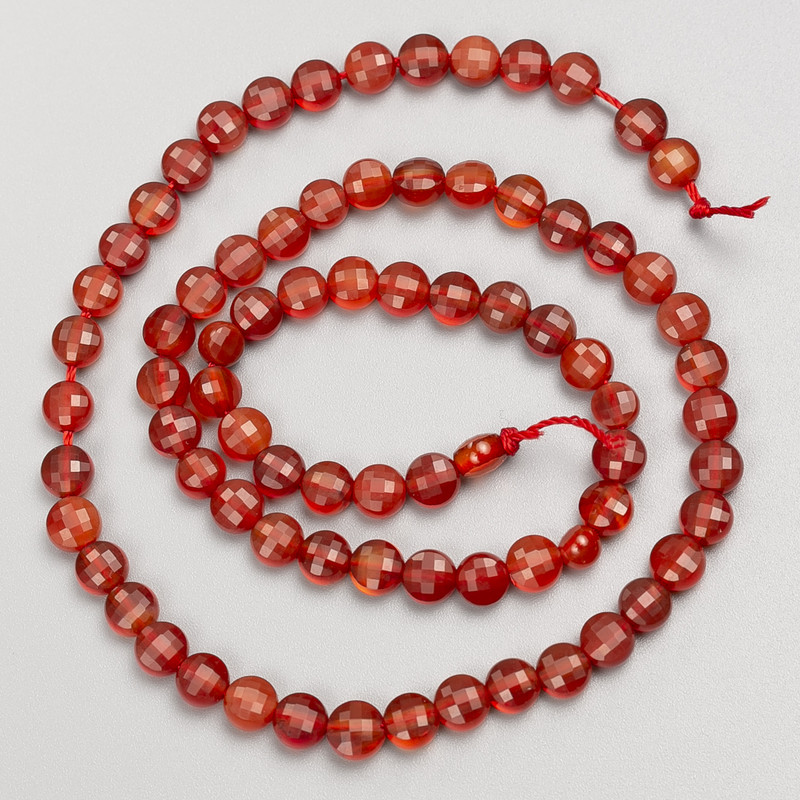 Carnelian gemstone beads, faceted coin-shaped, on thread, diameter 5x3.5 mm, length 38 cm+