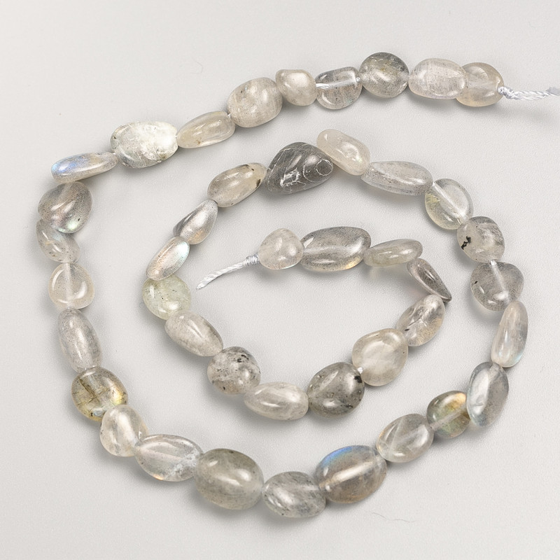 Beads of natural labradorite, faceted on thread, diameter 7×10 mm, length 40 cm