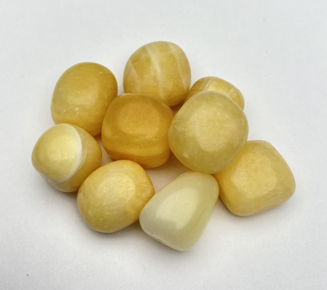 Souvenir natural stone Yellow Onyx faceting 22x18mm (+/-) 100g pack