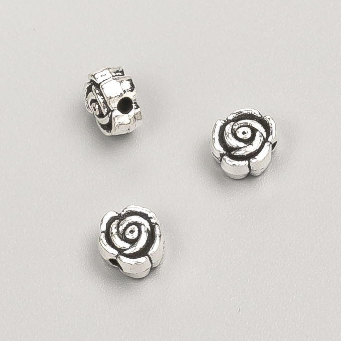 Bead-insert finding 'Flower', diameter 7×4mm, packaging 20 g, 39 pcs +/-, metal color 'silver'