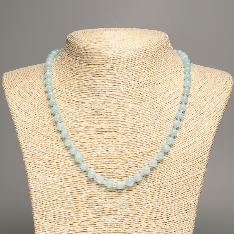 Light blue 'Aquamarine' necklace with smooth beads, approximately 6 mm diameter, approximately 50 cm long, made of white nephrite (synthetically dyed)