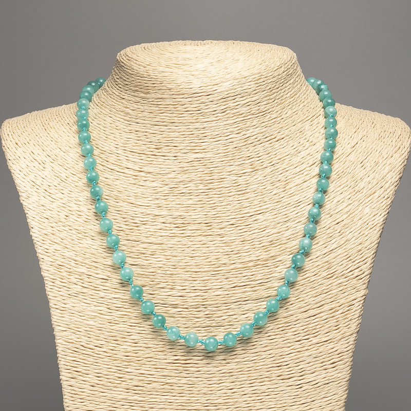 Necklace in light-green 'Aquamarine' with smooth beads, 6 mm diameter, approximately 50 cm long, made of white nephrite (synthetic-dyed)