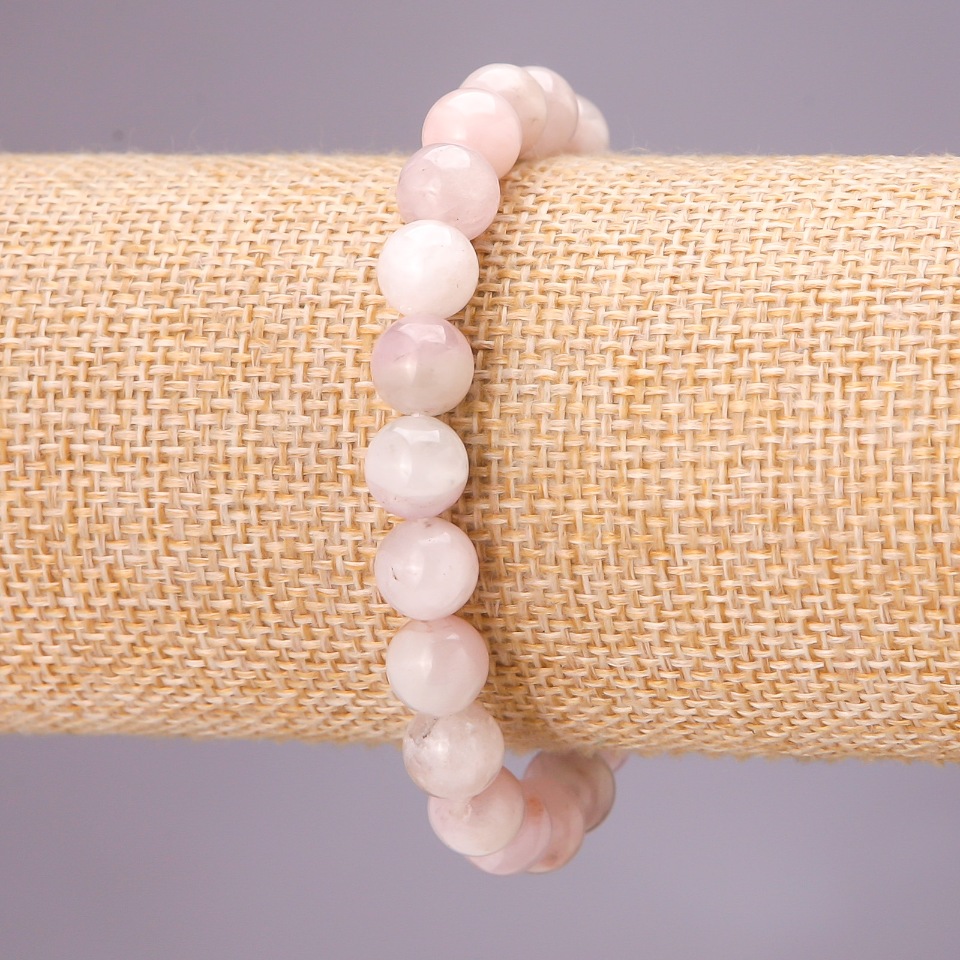 Bracelet of natural Kunzite on elastic cord, smooth bead, 8.5 mm diameter, 18 cm length