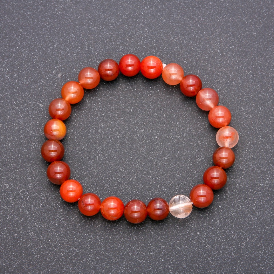 Bracelet made of natural rutile quartz on elastic cord, smooth beads, diameter 8 mm (±), length 18 cm