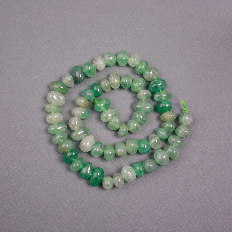 Beads on thread Nephrite natural stone, faceted, diameter 10x7 mm, length 39 cm