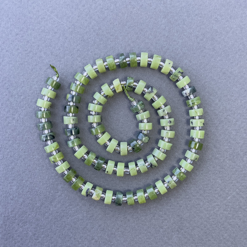 Canadian Jadeite Beads, disk-shaped natural stone on thread, diameter 6x3mm, length 39cm, with seed beads 3x2mm
