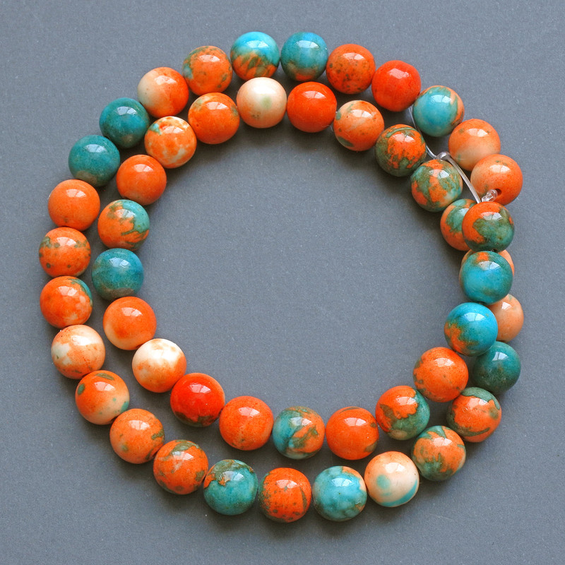 Beads 'Variscite' (artificial acrylic) orange, blue, and white smooth beads, 10 mm in diameter +/-, 40 cm +/- on beading thread