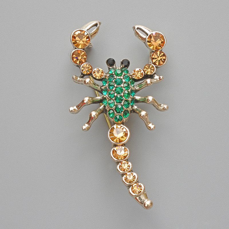 Brooch pendant Scorpion with green and yellow rhinestones, gold-tone metal 28x54 mm