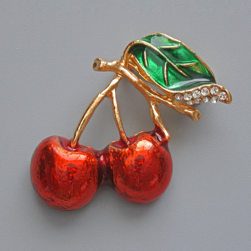 Cherry Brooch with red and green enamel, white rhinestones, gold-tone metal 22x35 mm
